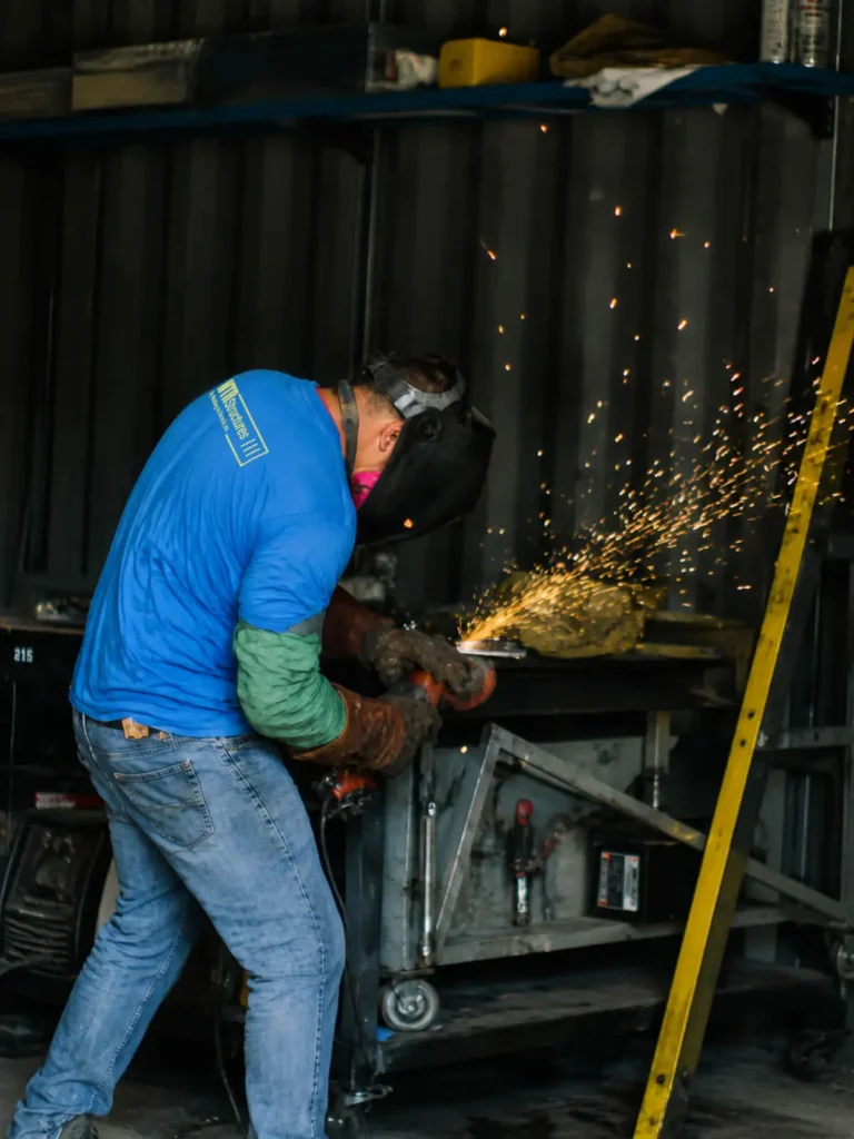 WTR team member fabricating a container structure at the Gainesville facility